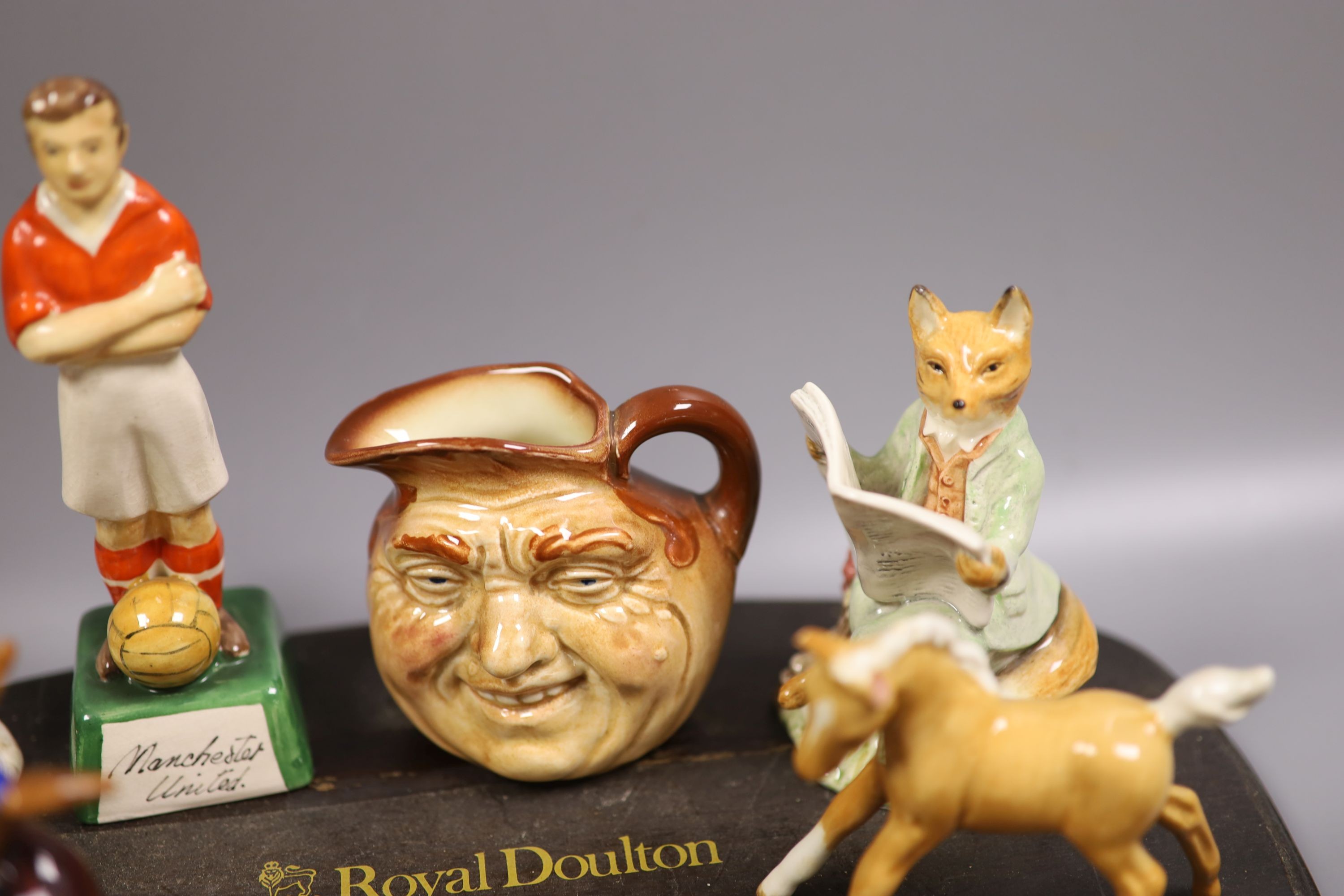 A collection of Royal Doulton miniature character mugs, figurines, series plate etc